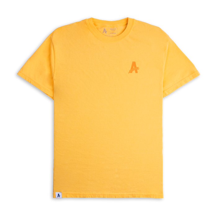a yellow t-shirt with Athletic Brewing logo