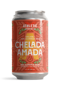 12 fl oz can of Athletic Brewing Chelada Amada non-alcoholic brew on a white background. The can features a coral-red label with a bold geometric pattern, lime slice illustrations, a large gold “A,” and the product name “Chelada Amada” in white lettering. Condensation droplets cover the can, emphasizing a cold, refreshing beverage.