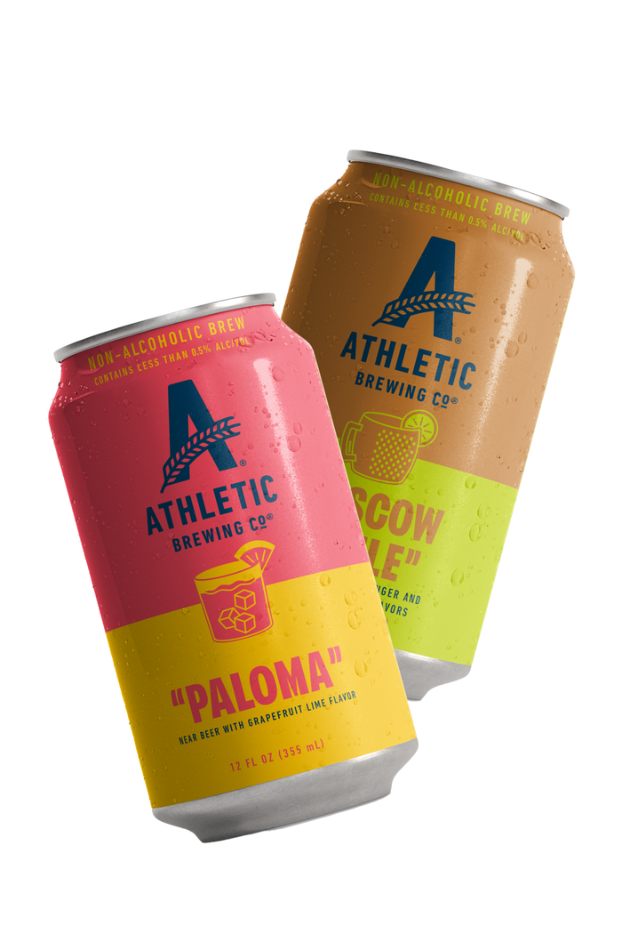 Two cans of Athletic Brewing Co. NA cocktail-inspired brews