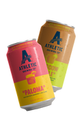 Two cans of Athletic Brewing Co. NA cocktail-inspired brews