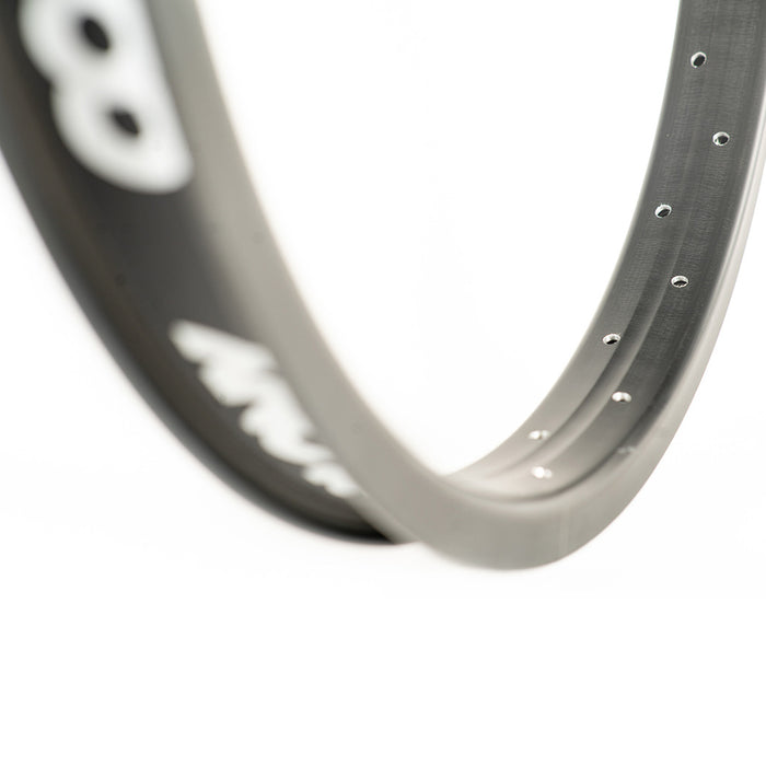 A close up of an affordable Colony Pintour 20 Inch Rim with a logo on it.