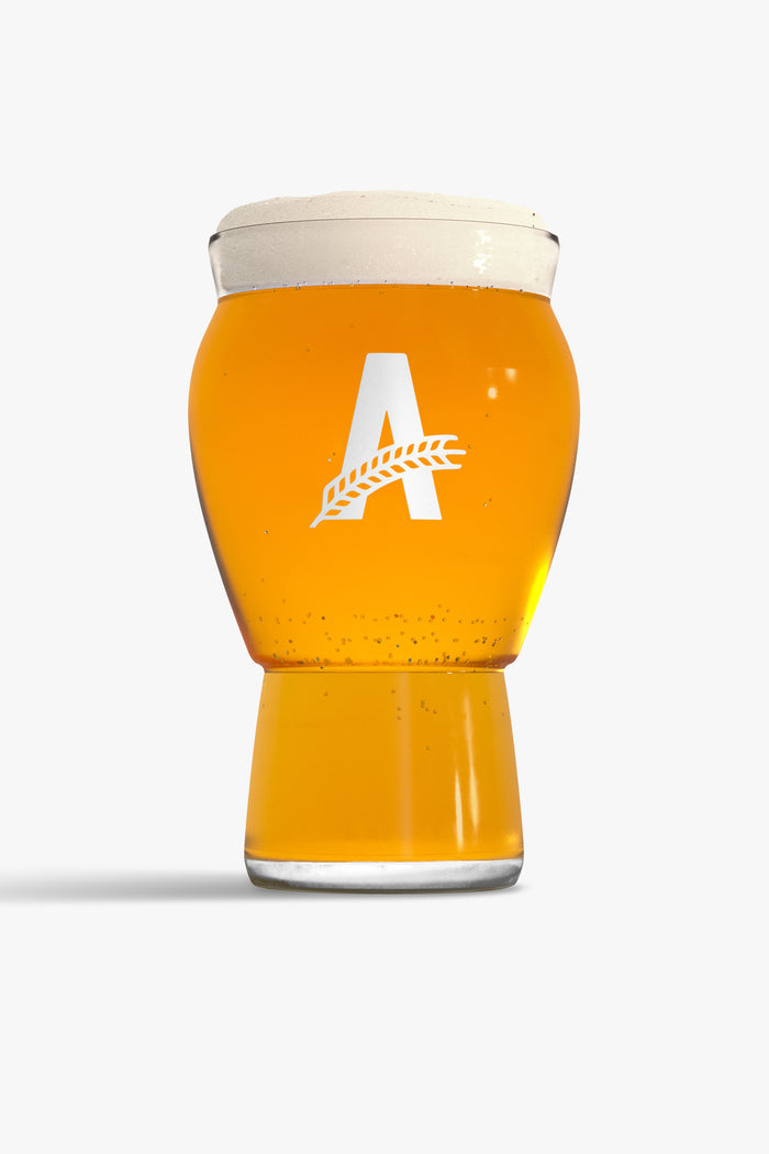 Craft master glass with beer showing the Athletic brewing logo