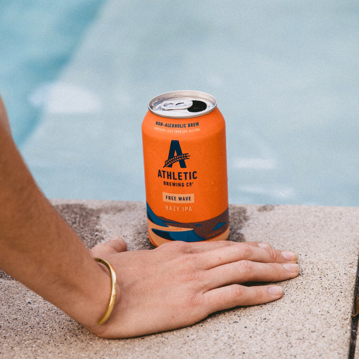 can of free wave next to water