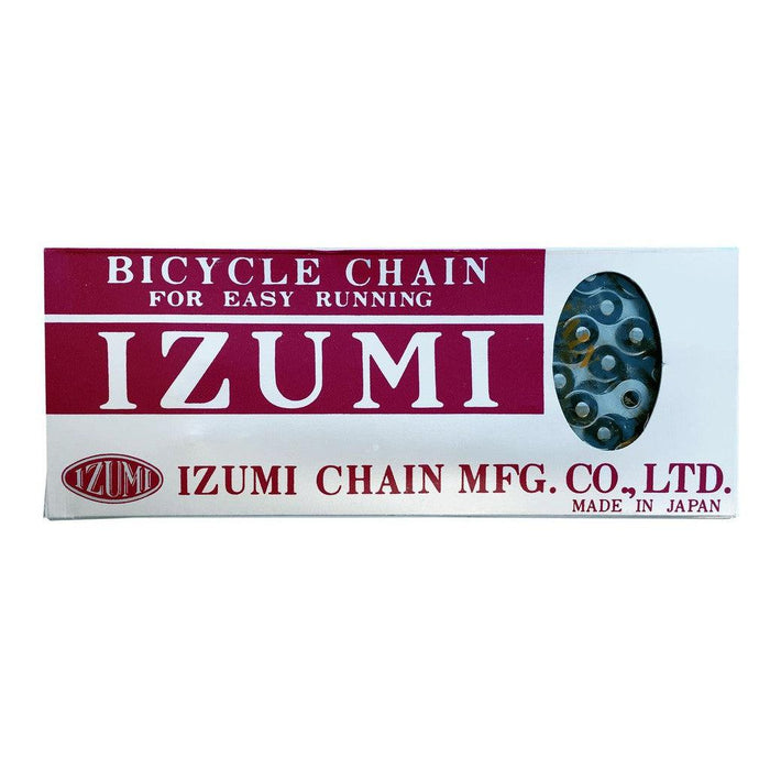 Box of Izumi 1/2 x 1/8 Inch Chain with a small window displaying the chain, labeled “IZUMI CHAIN MFG. CO., LTD. Made in Japan,” and “Bicycle Chain for Easy Running.” Renowned for its smooth performance, this Izumi chain is perfect as a reliable BMX or track chain.