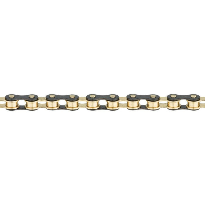 A close-up of an Izumi 1/2 x 1/8 Inch Chain in gold and black, arranged in a straight horizontal line on a white background.