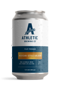 12 fl oz can of Athletic Brewing Pilot Program Mexican-Style Golden non-alcoholic brew with a clean white and navy label accented by a gold nameplate. The can is covered in condensation droplets and features the Athletic Brewing logo, “Pilot Program” branding, and product details including “Less Than 0.5% Alc/Vol.” The can is photographed against a black background, highlighting the limited-release beer packaging.
