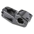 The Salt Am V2 Top Load Stem (22.2mm Clamp) is a black aluminum BMX stem featuring a four-bolt faceplate and side cutouts, labeled “SALT 50MM / 6061-T6 AL.” Precision-crafted from durable 6061-T6 alloy, it provides secure shark tooth clamping for reliable handlebar grip.