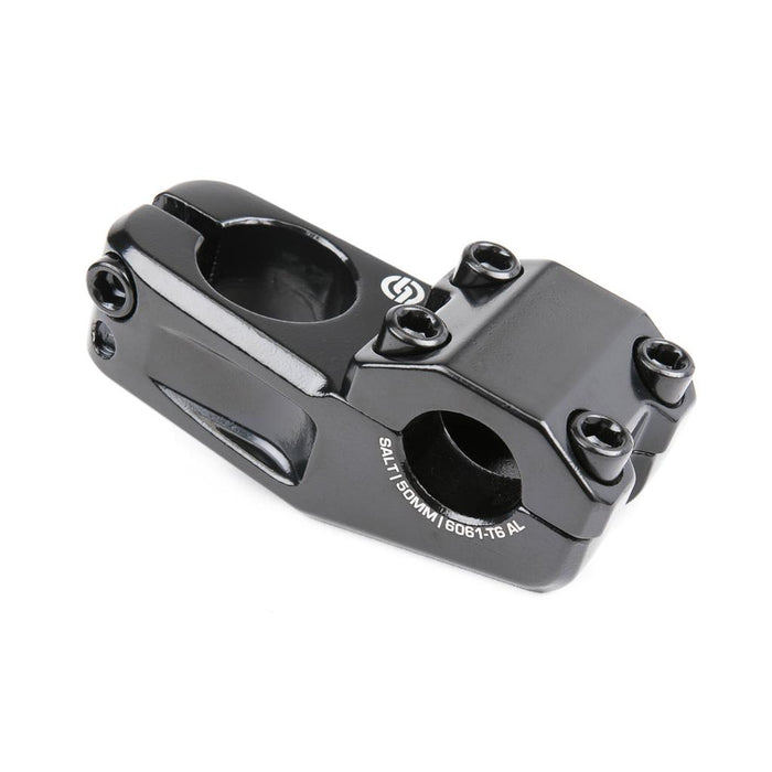 The Salt Am V2 Top Load Stem (22.2mm Clamp) features a black finish, four front-facing bolt holes, two distinct clamping areas, and is crafted from durable aluminum alloy—making it an affordable option for dependable performance.