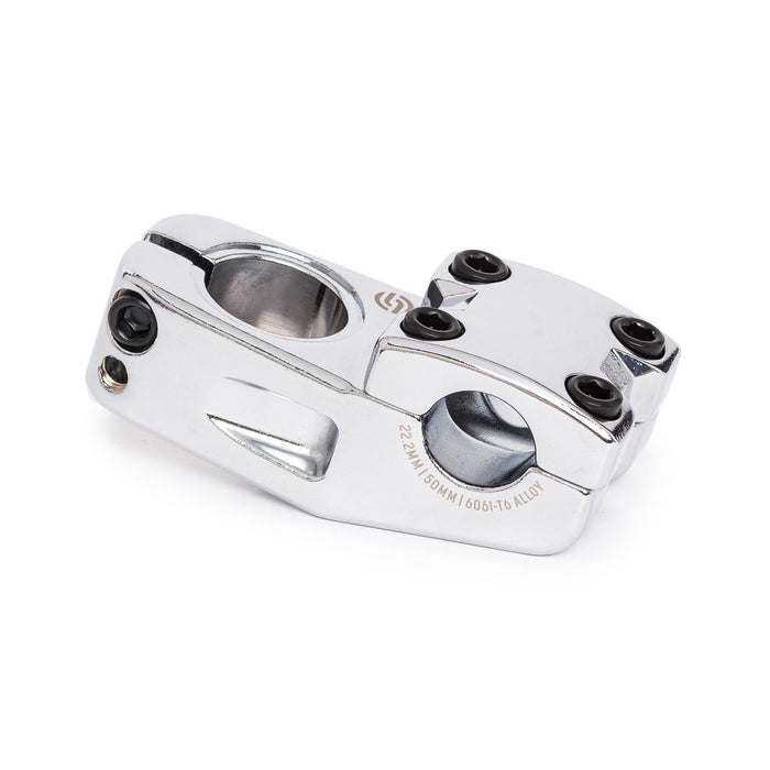 The Salt Am V2 Top Load Stem (22.2mm Clamp) is a polished metal bicycle stem made from durable 6061 T6 alloy, featuring multiple bolt holes, engraved specifications, and a shark tooth clamping design to securely attach handlebars to the steering tube.