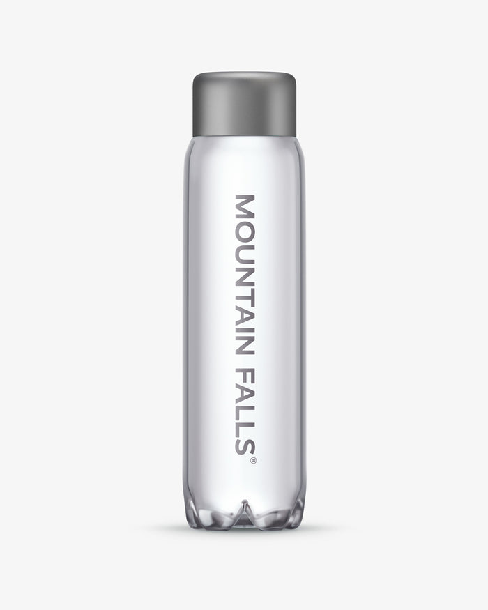 A 1 litre sparkling mineral water bottle with the brand name Mountain Falls printed on it.