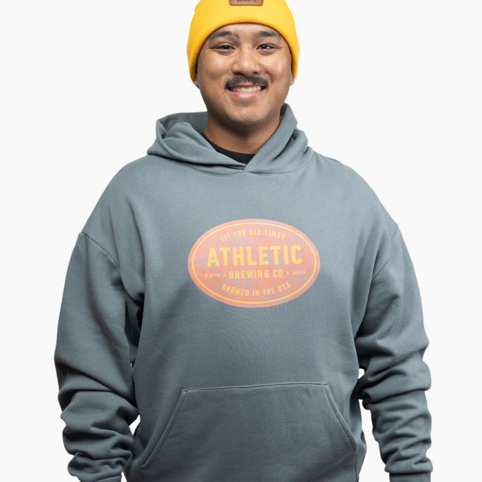 man wearing Athletic Brewing StampHoodie