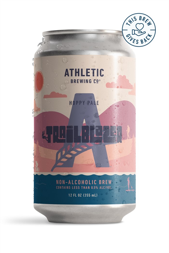 Front-facing view of a single Trailblazer Hoppy Pale non-alcoholic beer can with condensation, featuring a "This Brew Gives Back" circular seal in the top right.