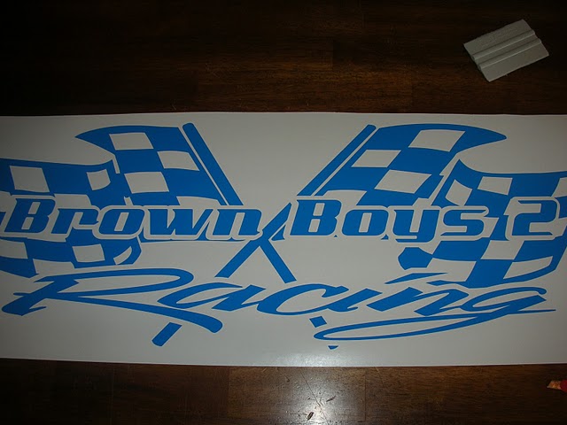 a sticker that says brown boys racing on it